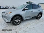 ✅ 2018 Toyota RAV4 LE • VIN: 2T3BFREV4JW802399 • Lot: 94268425. Listed on Copart with 114,198 mi. Free auction sales archive from the USA and detailed vehicle history report at DreamBid. Image 1.