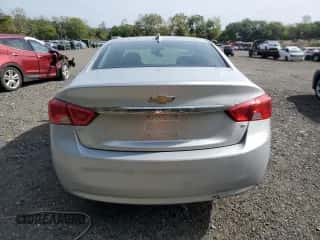 2017 Chevrolet Impala LT z VIN 1G1105S39HU154177, wystawiony jako Copart lot #81923465 z przebiegiem 93 059 mil mil oraz Szkoda całkowita • Salvage title. Historia ofert i sprzedaży dostępna na DreamBid. Obrazek 6.