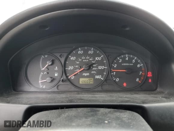 ✅ 2003 Mazda Protege DX • VIN: JM1BJ225930126453 • Лот: 80286785. Опубликован ранее на Copart с пробегом 106 034 миль. Бесплатный доступ к архиву аукционных продаж из США и подробный отчёт об истории автомобиля на DreamBid. Изображение 9.