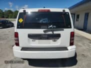 ✅ 2012 Jeep Liberty Sport • VIN: 1C4PJLAK8CW161131 • Lot: 82438025. Listed on Copart with 144,706 mi. Free auction sales archive from the USA and detailed vehicle history report at DreamBid. Image 6.