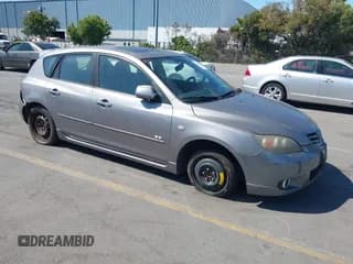 ✅ 2005 Mazda 3 s • VIN: JM1BK343751237434 • Lot: 42876724. Listed on IAAI with 258,658 mi. Free auction sales archive from the USA and detailed vehicle history report at DreamBid. Image 1.