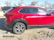 ✅ 2022 Mazda CX-30 S Premium • VIN: 3MVDMBDLXNM418896 • Lot: 43677405. Listed on IAAI with 29,689 mi. Free auction sales archive from the USA and detailed vehicle history report at DreamBid. Image 6.