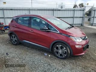 ✅ 2018 Chevrolet Bolt EV Premier • VIN: 1G1FX6S05J4139274 • Лот: 51660804. Опубликован ранее на Copart с пробегом 56 410 миль. Бесплатный доступ к архиву аукционных продаж из США и подробный отчёт об истории автомобиля на DreamBid. Изображение 4.