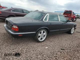 ✅ 2002 Jaguar XJ Sport • VIN: SAJDA12C82LF42173 • Лот: 68505174. Опубликован ранее на Copart с пробегом 142 675 миль. Бесплатный доступ к архиву аукционных продаж из США и подробный отчёт об истории автомобиля на DreamBid. Изображение 3.