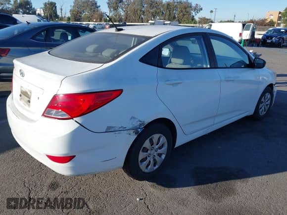 2015 Hyundai Accent GLS with VIN KMHCT4AE0FU927762, listed as a IAAI auction lot 43587608 with 128,365 mi miles and . Bid and sale history available at DreamBid. Image 4.