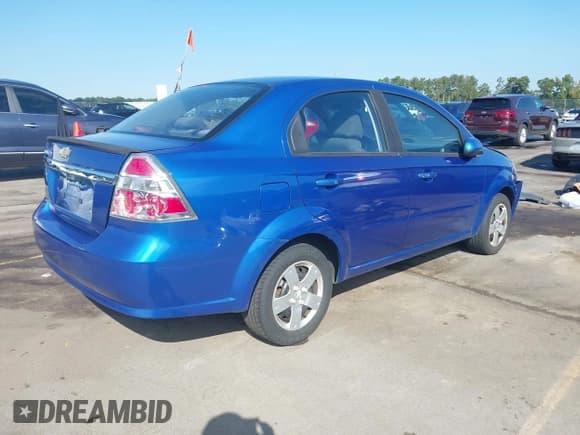 ✅ 2010 Chevrolet Aveo 1LT • VIN: KL1TD5DE8AB117147 • Lot: 43191809. Listed on IAAI with 130,988 mi. Free auction sales archive from the USA and detailed vehicle history report at DreamBid. Image 4.