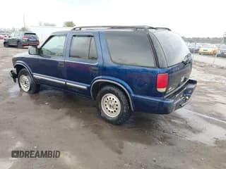 ✅ 2001 Chevrolet Blazer LT • VIN: 1GNDT13WX12208639 • Lot: 41673030. Wystawiony na IAAI z przebiegiem 164 093 mil. Bezpłatny archiwum sprzedaży aukcyjnych z USA i szczegółowy raport historii pojazdu na DreamBid. Zdjęcie 3.