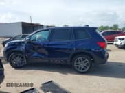 ✅ 2023 Honda Passport EX-L • VIN: 5FNYF8H59PB018864 • Lot: 42745399. Listed on IAAI with 77,035 mi. Free auction sales archive from the USA and detailed vehicle history report at DreamBid. Image 14.