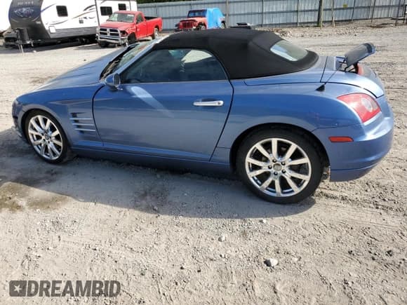 ✅ 2005 Chrysler Crossfire Limited • VIN: 1C3AN65L25X048761 • Lot: 70458634. Listed on Copart with Not provided. Free auction sales archive from the USA and detailed vehicle history report at DreamBid. Image 2.