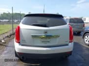 ✅ 2012 Cadillac SRX Performance Collection • VIN: 3GYFNBE30CS599466 • Lot: 42053911. Listed on IAAI with 167,242 mi. Free auction sales archive from the USA and detailed vehicle history report at DreamBid. Image 16.