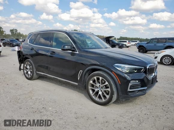✅ 2021 BMW X5 sDrive40i • VIN: 5UXCR4C09M9E35902 • Лот: 86171425. Опубликован ранее на Copart с пробегом 88 482 миль. Бесплатный доступ к архиву аукционных продаж из США и подробный отчёт об истории автомобиля на DreamBid. Изображение 4.