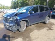 ✅ 2022 Honda Passport EX-L • VIN: 5FNYF8H51NB010125 • Lot: 43336438. Listed on IAAI with 18,292 mi. Free auction sales archive from the USA and detailed vehicle history report at DreamBid. Image 2.