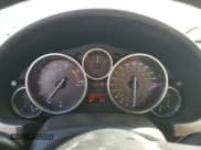 ✅ 2009 Mazda MX-5 Miata Touring • VIN: JM1NC25F090203358 • Lot: 49343475. Listed on Copart with 205,477 mi. Free auction sales archive from the USA and detailed vehicle history report at DreamBid. Image 9.