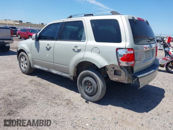 ✅ 2009 Ford Escape Limited • VIN: 1FMCU04G79KB35059 • Lot: 42302842. Listed on IAAI with 248,440 mi. Free auction sales archive from the USA and detailed vehicle history report at DreamBid. Image 3.