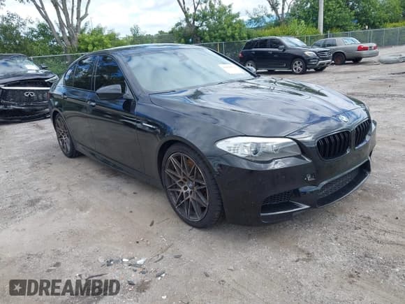 ✅ 2013 BMW M5 • VIN: WBSFV9C51DC773385 • Lot: 43478874. Listed on IAAI with 106,547 mi. Free auction sales archive from the USA and detailed vehicle history report at DreamBid. Image 1.