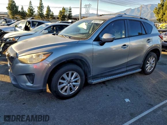 ✅ 2014 Mazda CX-5 Sport • VIN: JM3KE2BE5E0379221 • Lot: 96541255. Listed on Copart with 216,899 mi. Free auction sales archive from the USA and detailed vehicle history report at DreamBid. Image 1.