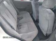 ✅ 2002 Kia Spectra • VIN: KNAFB121725173856 • Лот: 42609686. Опубликован ранее на IAAI с пробегом 160 894 миль. Бесплатный доступ к архиву аукционных продаж из США и подробный отчёт об истории автомобиля на DreamBid. Изображение 8.