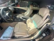 ✅ 2004 BMW 6 Series 645Ci • VIN: WBAEK734X4B260677 • Лот: 50924995. Опубликован ранее на Copart с пробегом 42 209 миль. Бесплатный доступ к архиву аукционных продаж из США и подробный отчёт об истории автомобиля на DreamBid. Изображение 5.