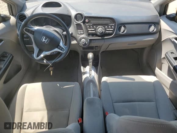 ✅ 2014 Honda Insight LX • VIN: JHMZE2H52ES000774 • Lot: 66814285. Wystawiony na Copart z przebiegiem 169 387 mil. Bezpłatny archiwum sprzedaży aukcyjnych z USA i szczegółowy raport historii pojazdu na DreamBid. Zdjęcie 8.