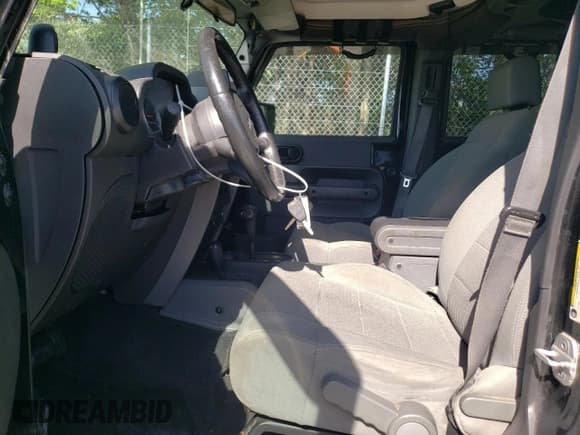 ✅ 2007 Jeep Wrangler Unlimited Rubicon • VIN: 1J4GA69157L162476 • Lot: 56277085. Wystawiony na Copart z przebiegiem 127 084 mil. Bezpłatny archiwum sprzedaży aukcyjnych z USA i szczegółowy raport historii pojazdu na DreamBid. Zdjęcie 7.