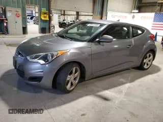 2014 Hyundai Veloster z VIN KMHTC6ADXEU204681, wystawiony jako Copart lot #90672405 z przebiegiem 99 196 mil mil oraz Czysty tytuł • Clean title. Historia ofert i sprzedaży dostępna na DreamBid. Obrazek 1.