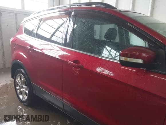 ✅ 2013 Ford Escape SEL • VIN: 1FMCU9HX2DUB79885 • Lot: 42341050. Listed on IAAI with 117,236 mi. Free auction sales archive from the USA and detailed vehicle history report at DreamBid. Image 13.
