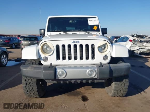 ✅ 2015 Jeep Wrangler Unlimited Sahara • VIN: 1C4BJWEG9FL519182 • Lot: 43672663. Listed on IAAI with 107,421 mi. Free auction sales archive from the USA and detailed vehicle history report at DreamBid. Image 12.