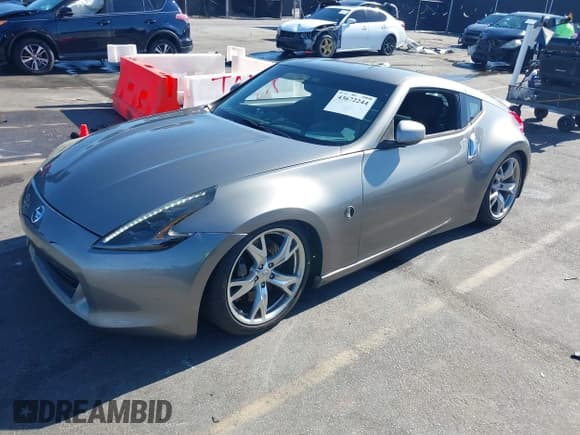 ✅ 2009 Nissan 370Z Touring • VIN: JN1AZ44E39M404491 • Lot: 43672244. Listed on IAAI with 118,427 mi. Free auction sales archive from the USA and detailed vehicle history report at DreamBid. Image 2.