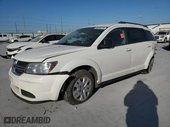 ✅ 2016 Dodge Journey SE • VIN: 3C4PDCABXGT166138 • Lot: 86498725. Listed on Copart with 126,852 mi. Free auction sales archive from the USA and detailed vehicle history report at DreamBid. Image 1.