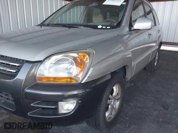 ✅ 2005 Kia Sportage LX • VIN: KNDJF723157069815 • Lot: 43409269. Wystawiony na IAAI z przebiegiem 137 862 mil. Bezpłatny archiwum sprzedaży aukcyjnych z USA i szczegółowy raport historii pojazdu na DreamBid. Zdjęcie 6.