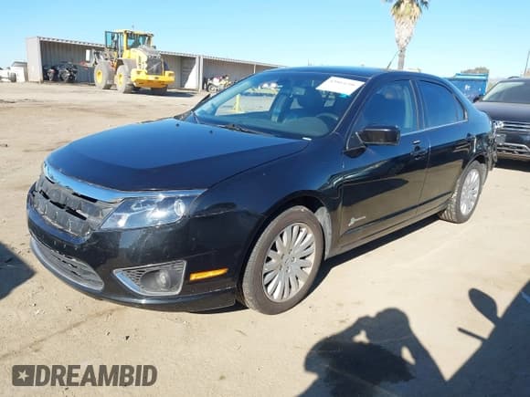 ✅ 2012 Ford Fusion Hybrid • VIN: 3FADP0L30CR225256 • Лот: 43864206. Опубликован ранее на IAAI с пробегом 135 293 миль. Бесплатный доступ к архиву аукционных продаж из США и подробный отчёт об истории автомобиля на DreamBid. Изображение 2.