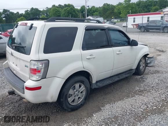 ✅ 2010 Mercury Mariner • VIN: 4M2CN8BG3AKJ22391 • Lot: 39988241. Listed on IAAI with 218,423 mi. Free auction sales archive from the USA and detailed vehicle history report at DreamBid. Image 4.
