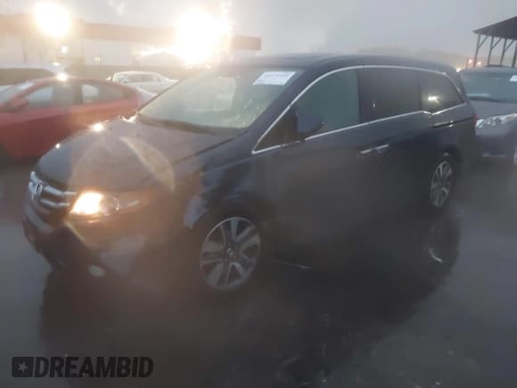✅ 2014 Honda Odyssey Touring • VIN: 5FNRL5H93EB025644 • Lot: 43573115. Listed on IAAI with 78,012 mi. Free auction sales archive from the USA and detailed vehicle history report at DreamBid. Image 18.