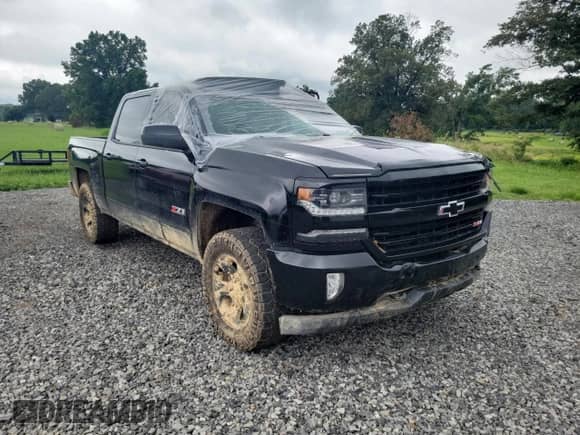 2017 Chevrolet Silverado 1500 LTZ with VIN 3GCUKSEJ1HG477844, listed as a Copart auction lot 64993025 with 147,904 mi miles and Salvage title. Bid and sale history available at DreamBid. Image 1.