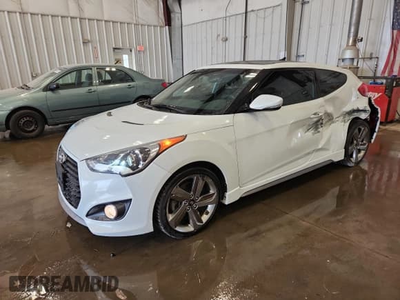 ✅ 2014 Hyundai Veloster Turbo • VIN: KMHTC6AE9EU196159 • Lot: 71451785. Wystawiony na Copart z przebiegiem 77 852 mil. Bezpłatny archiwum sprzedaży aukcyjnych z USA i szczegółowy raport historii pojazdu na DreamBid. Zdjęcie 1.