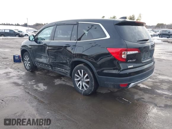 ✅ 2020 Honda Pilot EX-L • VIN: 5FNYF6H50LB022798 • Lot: 41592012. Listed on IAAI with 67,045 mi. Free auction sales archive from the USA and detailed vehicle history report at DreamBid. Image 3.