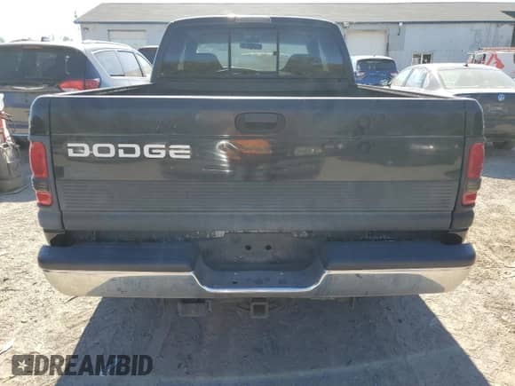 2001 Dodge 1500 z VIN 3B7HC13Y31G199091, wystawiony jako Copart lot #74186904 z przebiegiem 140 674 mil mil oraz Czysty tytuł • Clean title. Historia ofert i sprzedaży dostępna na DreamBid. Obrazek 6.