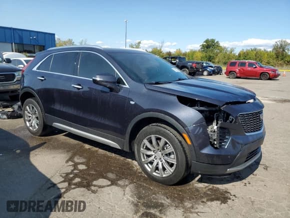 ✅ 2022 Cadillac XT4 AWD Premium Luxury • VIN: 1GYFZDR43NF147702 • Lot: 71853225. Wystawiony na Copart z przebiegiem 27 868 mil. Bezpłatny archiwum sprzedaży aukcyjnych z USA i szczegółowy raport historii pojazdu na DreamBid. Zdjęcie 4.