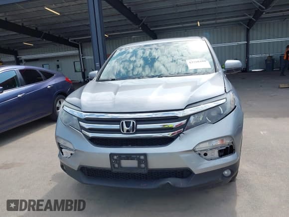 ✅ 2018 Honda Pilot EX-L • VIN: 5FNYF6H59JB045137 • Lot: 43168480. Listed on IAAI with 109,034 mi. Free auction sales archive from the USA and detailed vehicle history report at DreamBid. Image 12.