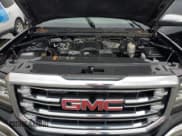 ✅ 2017 GMC Sierra 1500 SLT • VIN: 3GTU2NEC2HG182965 • Лот: 90094485. Опубликован ранее на Copart с пробегом 137 920 миль. Бесплатный доступ к архиву аукционных продаж из США и подробный отчёт об истории автомобиля на DreamBid. Изображение 11.