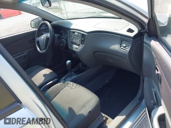 ✅ 2008 Kia Rio LX • VIN: KNADE123686387207 • Lot: 43029854. Listed on IAAI with 132,447 mi. Free auction sales archive from the USA and detailed vehicle history report at DreamBid. Image 5.