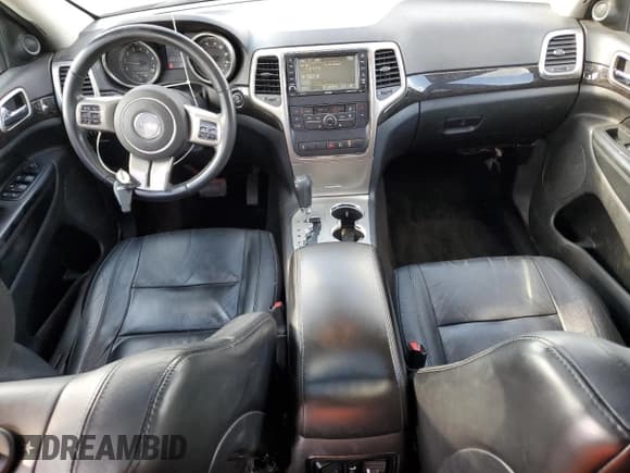 ✅ 2013 Jeep Grand Cherokee Laredo • VIN: 1C4RJFAG2DC543471 • Lot: 91461505. Listed on Copart with 188,784 mi. Free auction sales archive from the USA and detailed vehicle history report at DreamBid. Image 8.