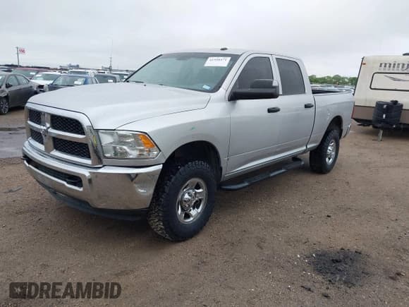 ✅ 2013 Ram 2500 Tradesman • VIN: 3C6TR5CT1DG562584 • Lot: 41958471. Listed on IAAI with 185,426 mi. Free auction sales archive from the USA and detailed vehicle history report at DreamBid. Image 2.