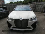 ✅ 2022 BMW iX xDrive50 • VIN: WB523CF09NCJ43040 • Lot: 42532305. Listed on IAAI with 17,492 mi. Free auction sales archive from the USA and detailed vehicle history report at DreamBid. Image 12.
