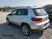 ✅ 2013 Volkswagen Tiguan SE • VIN: WVGBV7AX0DW520423 • Lot: 68394895. Listed on Copart with 128,141 mi. Free auction sales archive from the USA and detailed vehicle history report at DreamBid. Image 2.