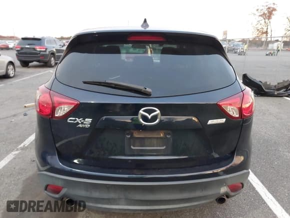 ✅ 2015 Mazda CX-5 Touring • VIN: JM3KE4CY0F0472217 • Lot: 43603807. Listed on IAAI with 159,653 mi. Free auction sales archive from the USA and detailed vehicle history report at DreamBid. Image 16.