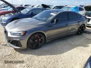 ✅ 2022 Audi RS 5 Sportback • VIN: WUAAWCF57NA901250 • Lot: 77305584. Listed on Copart with Not provided. Free auction sales archive from the USA and detailed vehicle history report at DreamBid. Image 1.