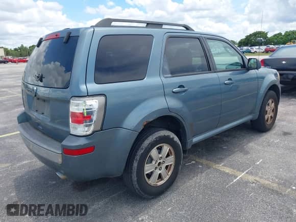 2010 Mercury Mariner with VIN 4M2CN8B76AKJ12857, listed as a IAAI auction lot 42575710 with 290,813 mi miles and . Bid and sale history available at DreamBid. Image 4.