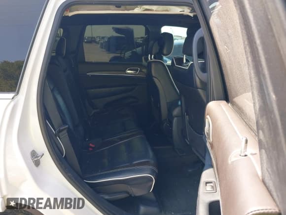 ✅ 2017 Jeep Grand Cherokee Overland • VIN: 1C4RJFCG1HC836961 • Lot: 43054609. Listed on IAAI with 133,975 mi. Free auction sales archive from the USA and detailed vehicle history report at DreamBid. Image 8.