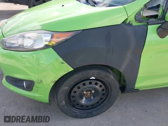 ✅ 2014 Ford Fiesta SE • VIN: 3FADP4EJ4EM189977 • Lot: 43384977. Wystawiony na IAAI z przebiegiem 137 690 mil. Bezpłatny archiwum sprzedaży aukcyjnych z USA i szczegółowy raport historii pojazdu na DreamBid. Zdjęcie 6.